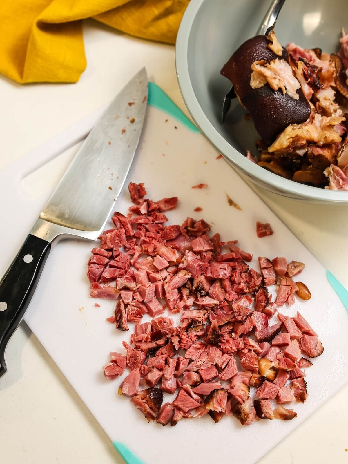 chopping ham removed from ham hock.