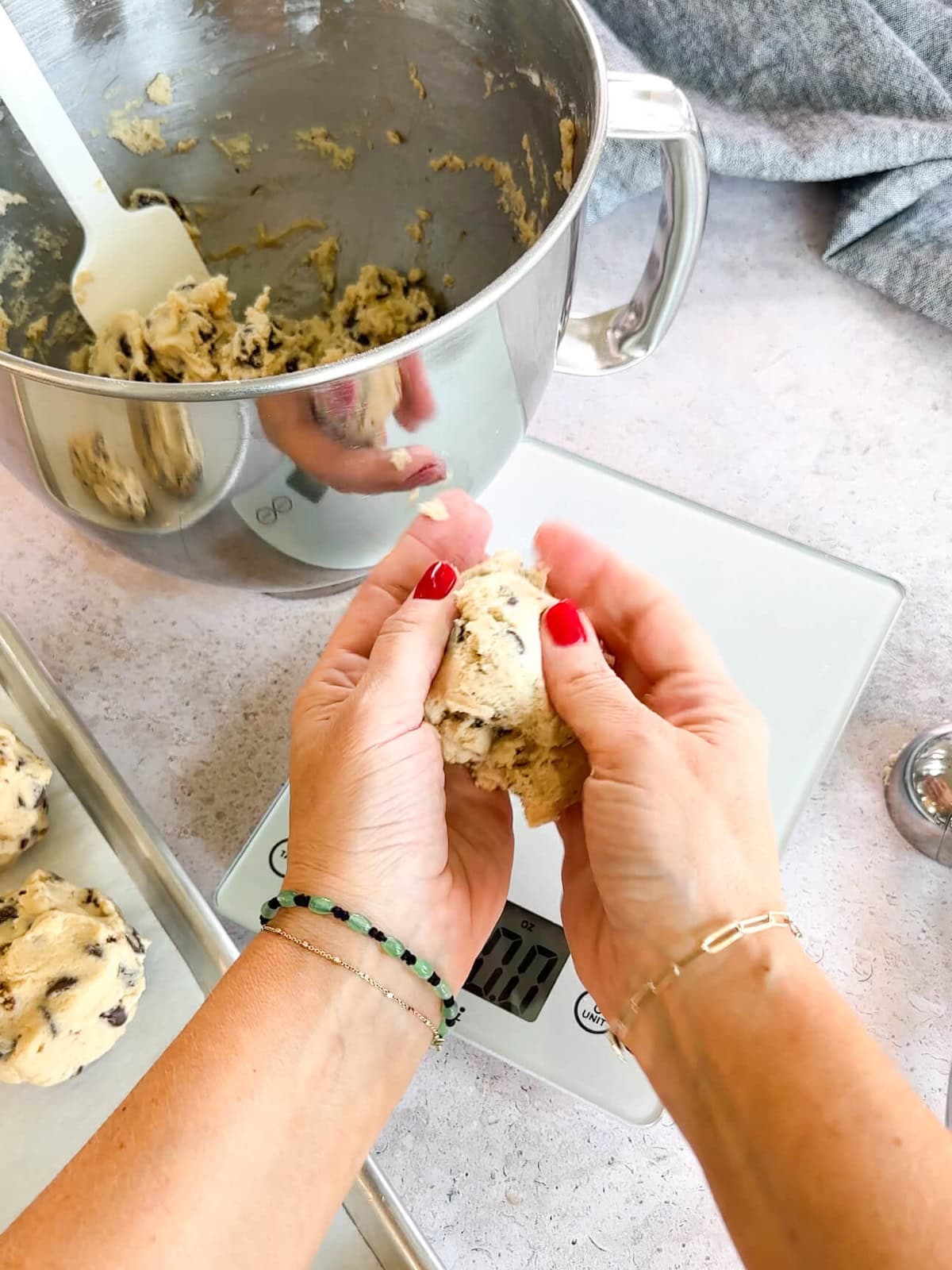 rolling dough into balls for large cookies