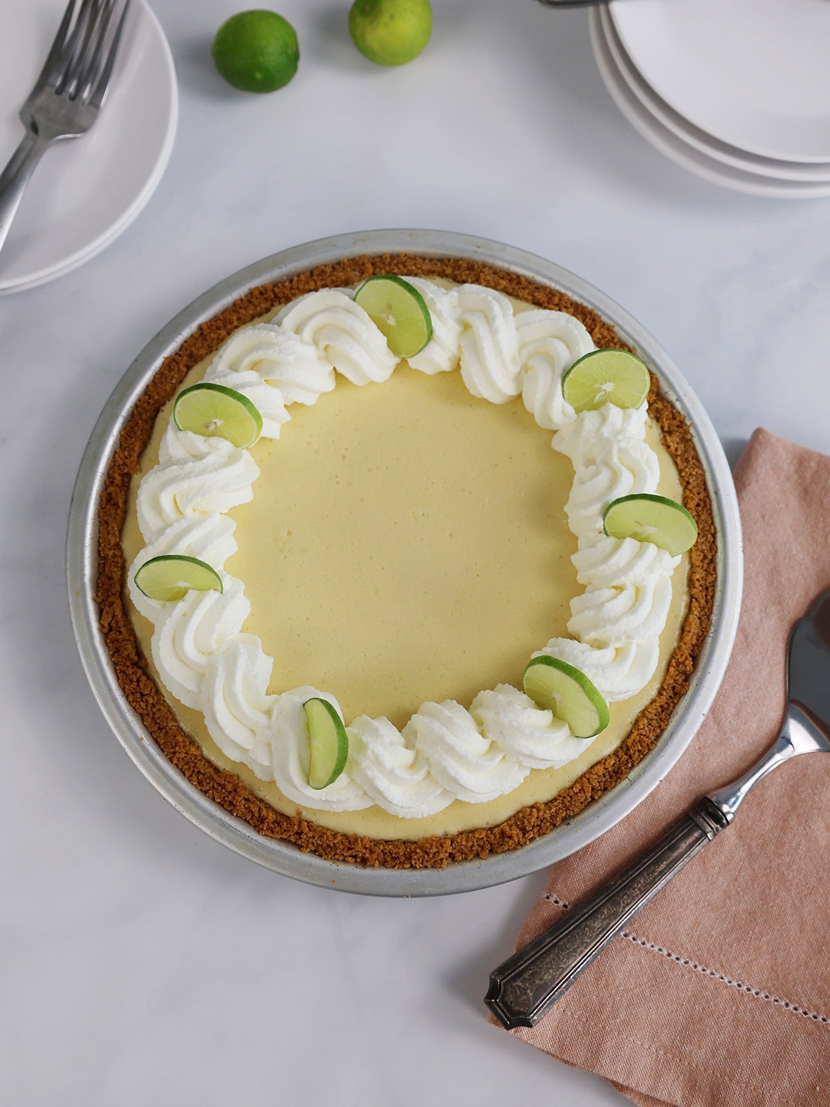 Top view of a garnished Key lime pie.