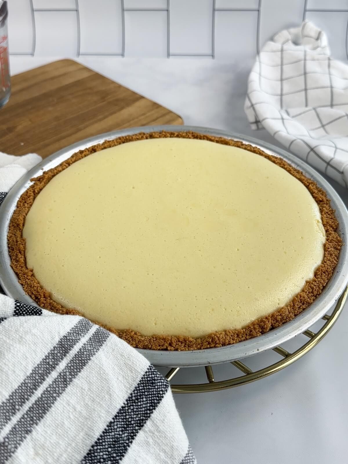 Baked key lime pie just barely jiggles when it comes out of the oven and continues to set as it cools.