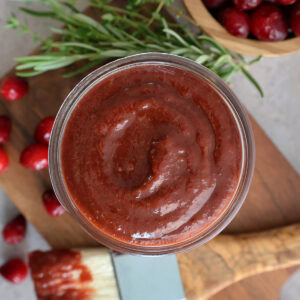 Close up of the top of a bowl of cranberry bbq sauce.