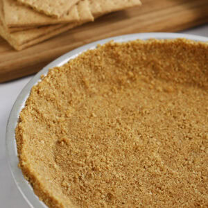 Close up of a graham cracker pie crust.