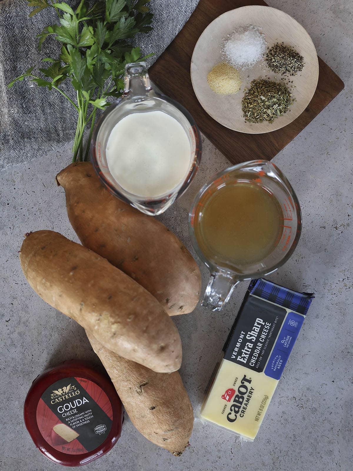 Ingredients needed for scalloped sweet potatoes.