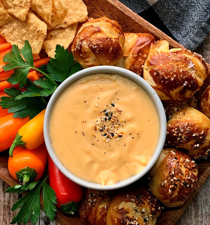 A Gouda Life blog picture of beer cheese dip with pretzel bites.