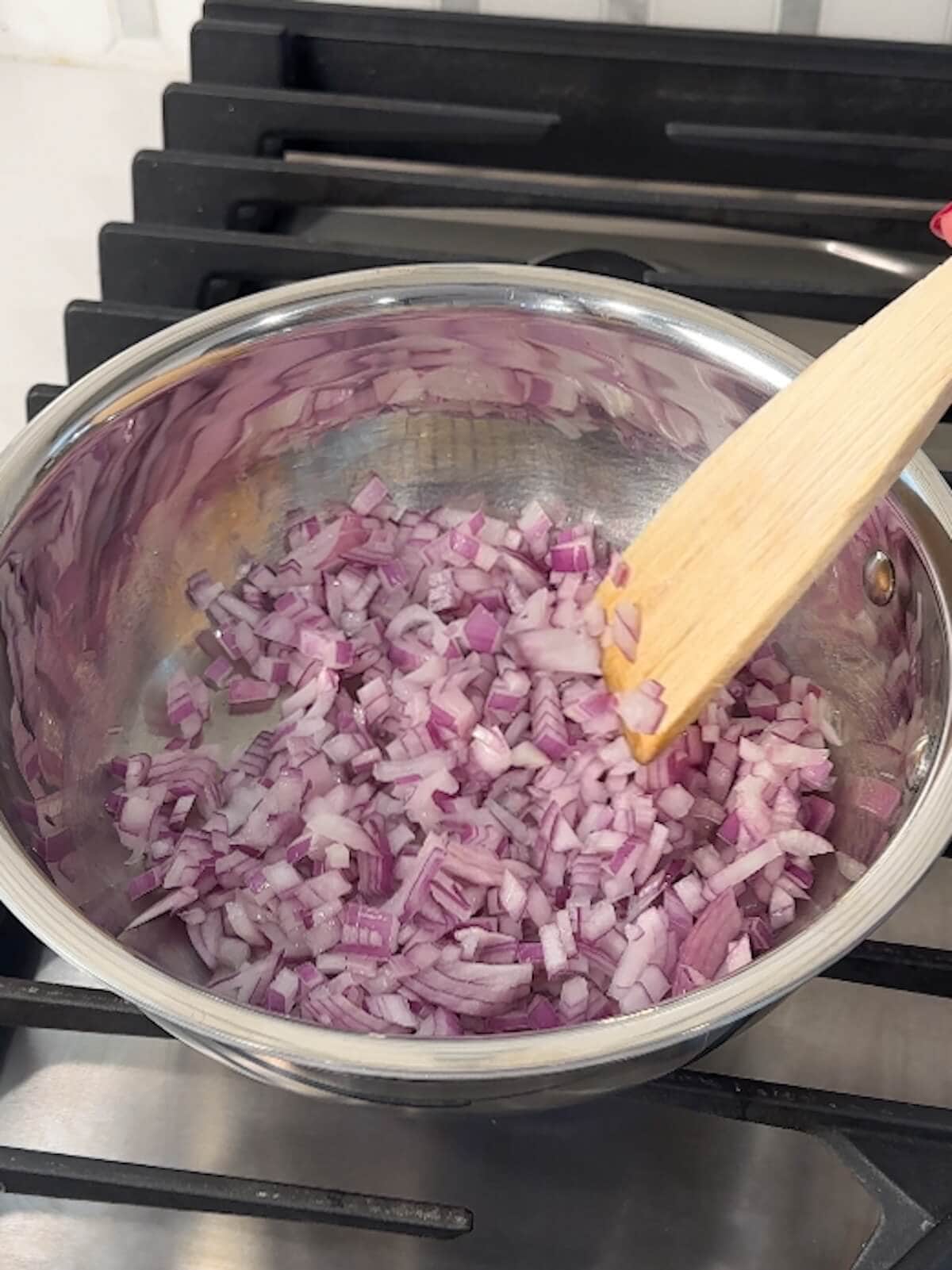 Chopped red onions in a bowl.