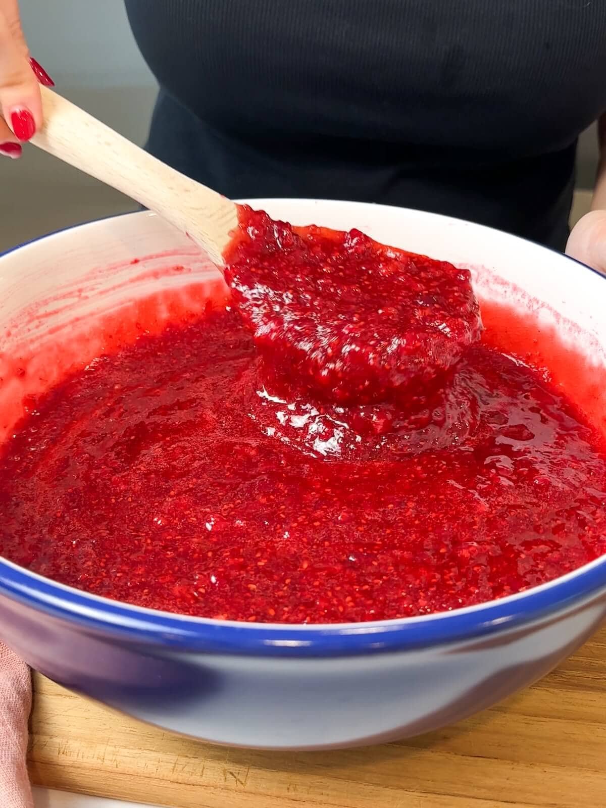 stirring jam mixture until sugar is dissolved.