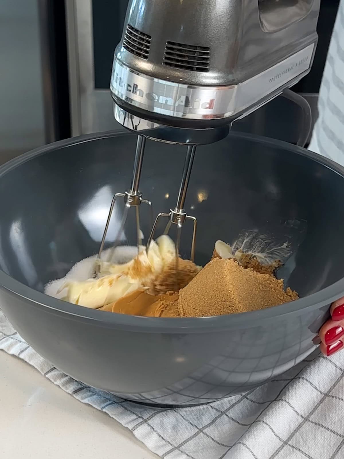 cream the butter, sugars, and peanut butter together for peanut butter cookies.