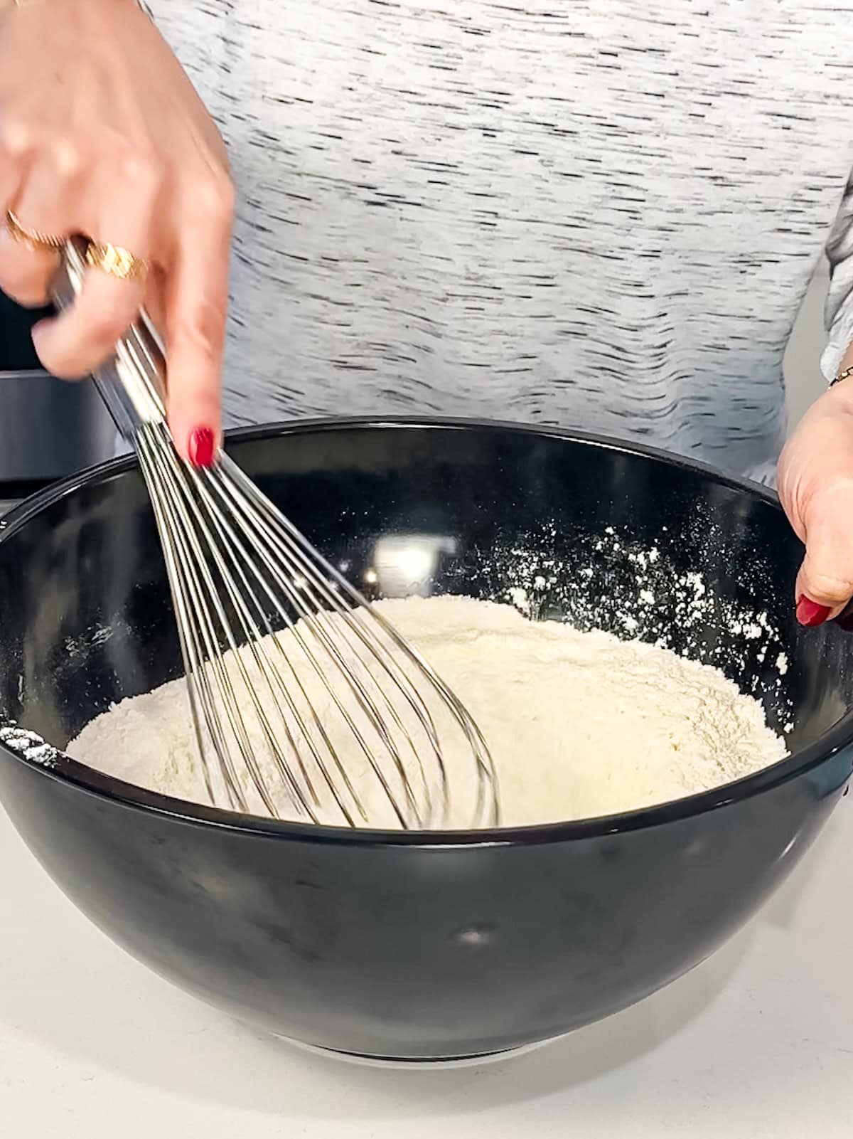 Mixing dry ingredients for soft cornbread.