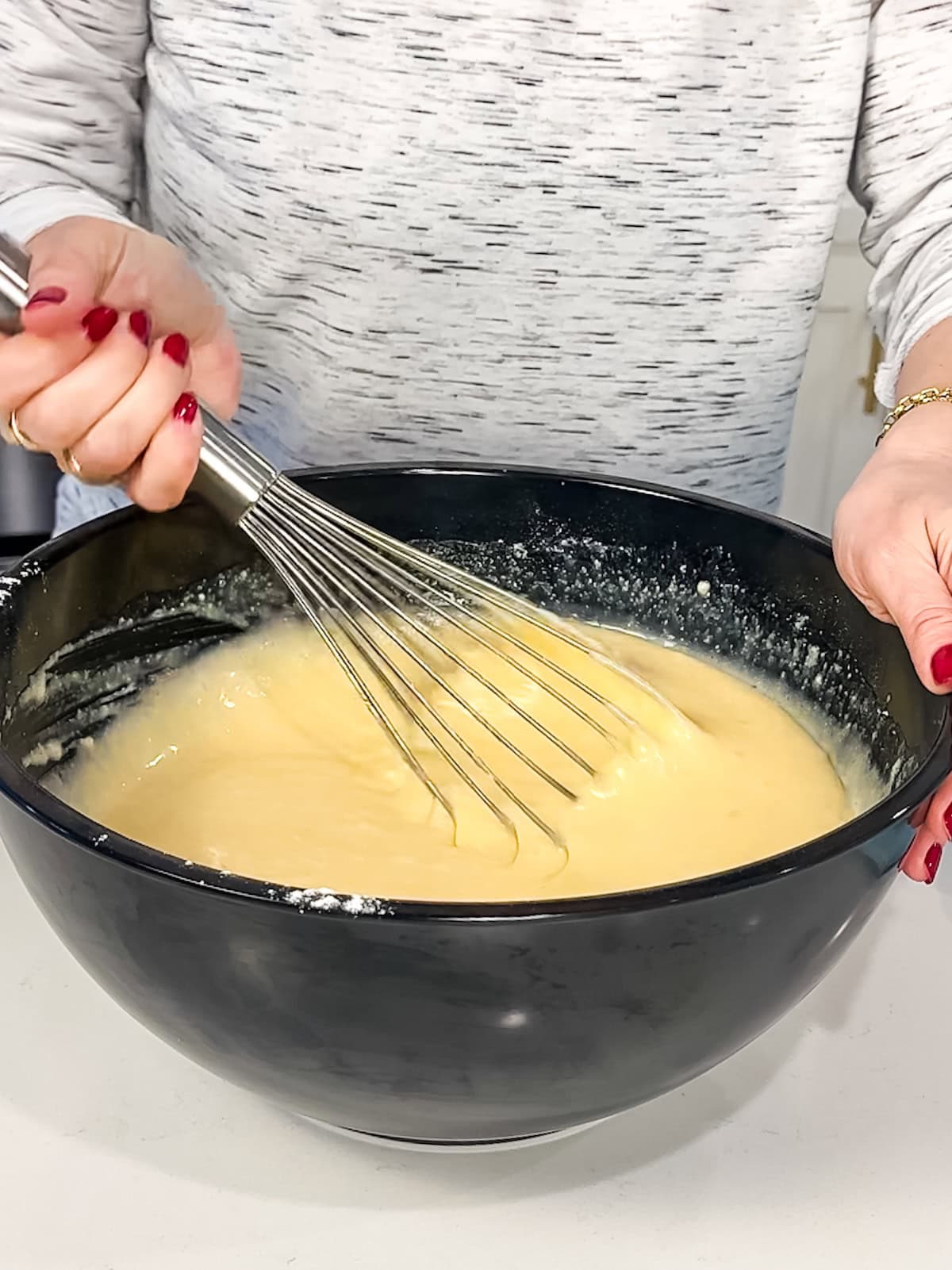 Whisk together the ingredients to make a sweet cornbread batter.
