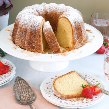 cake with a slice out on a plate feature image