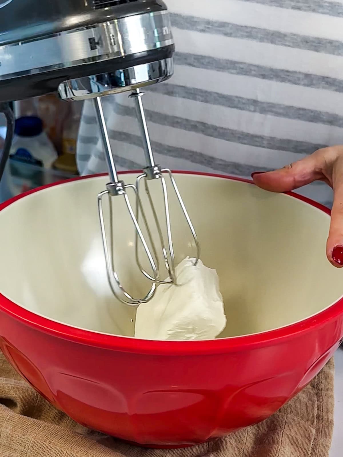beat cream cheese until smooth in a large bowl.