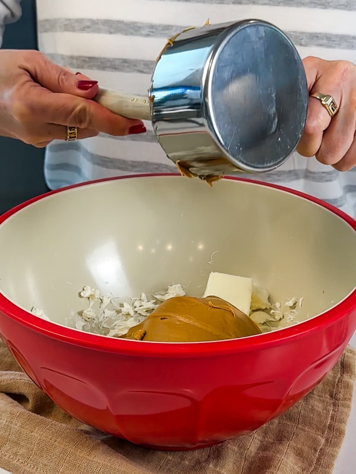 Add butter and peanut butter to the bowl.