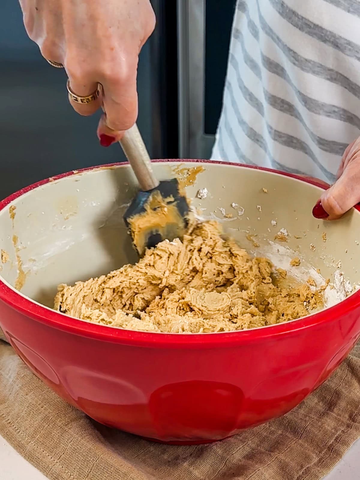 Thick peanut butter frosting in a bowl.