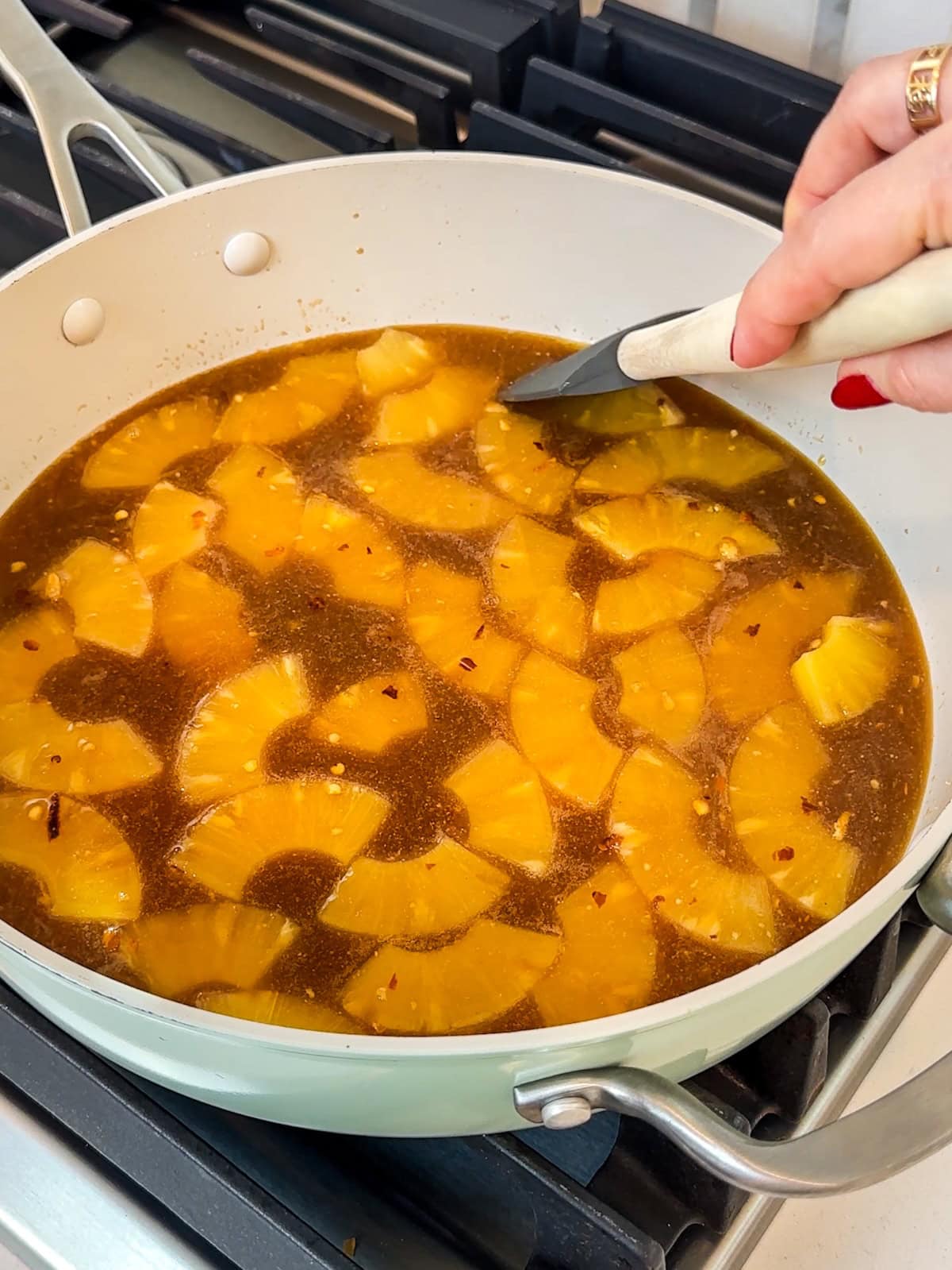 Bring sauce to a simmer, stirring occasionally to make pineapple sauce.