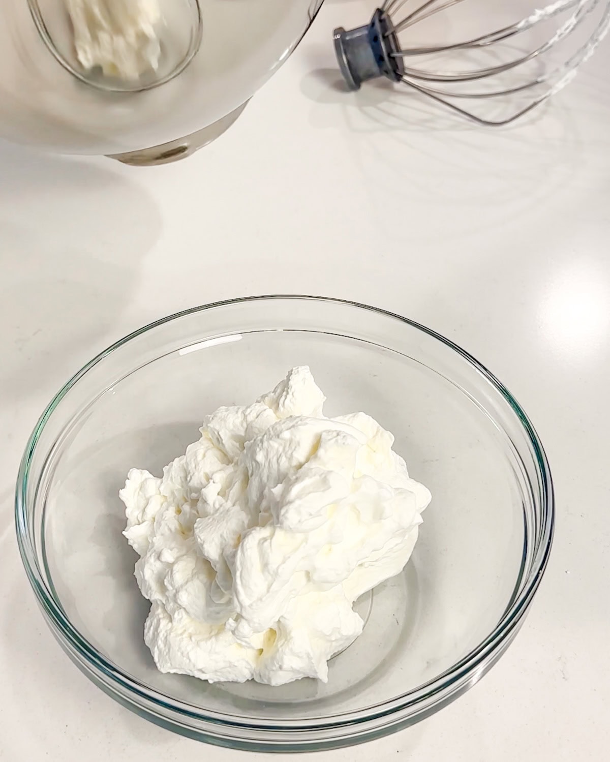 whipped cream in a bowl ready for filling.