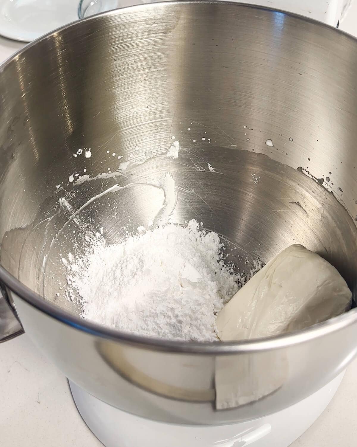 whipping cream cheese and sugar together for the filling.