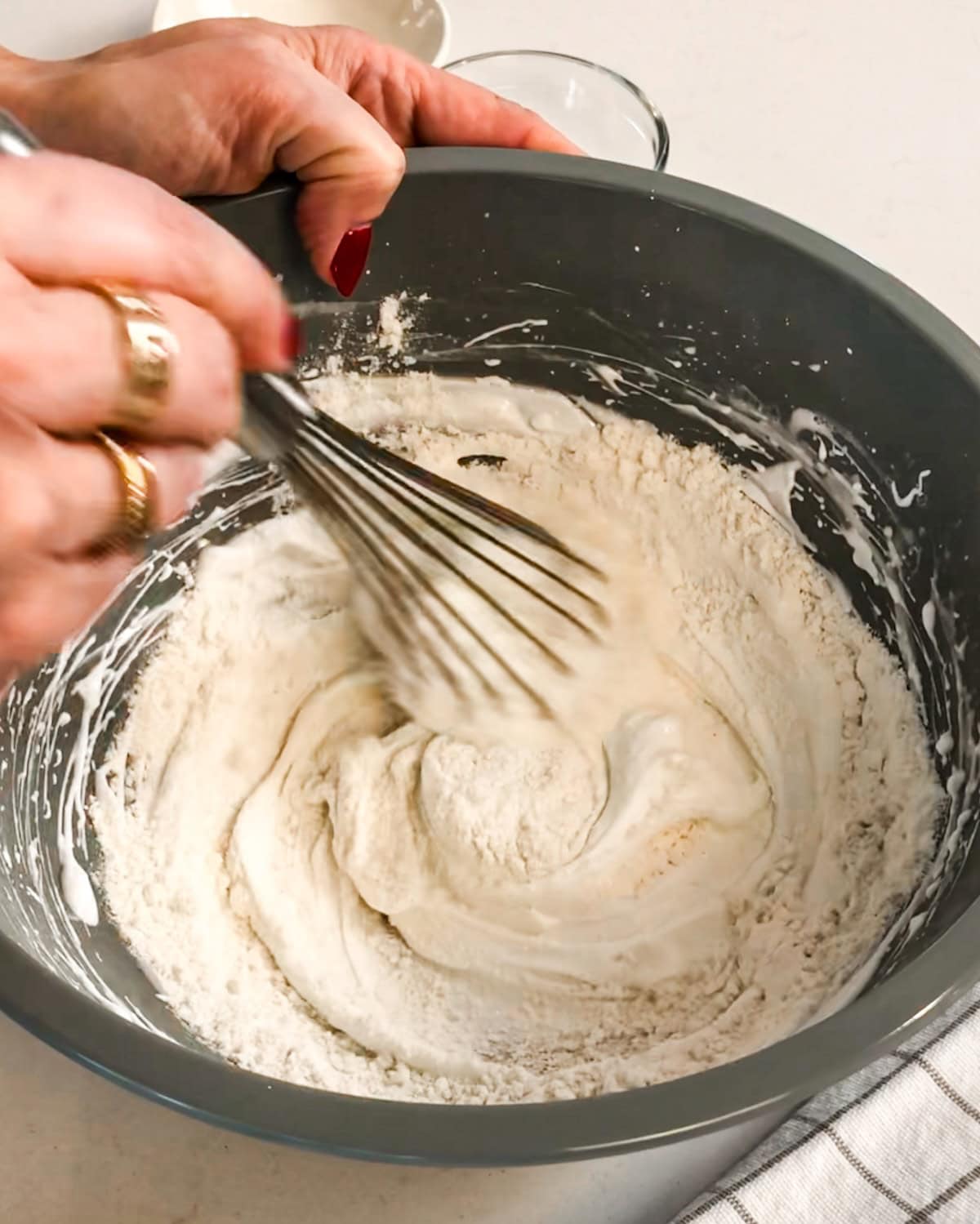 Whisk flour mixture in by hand