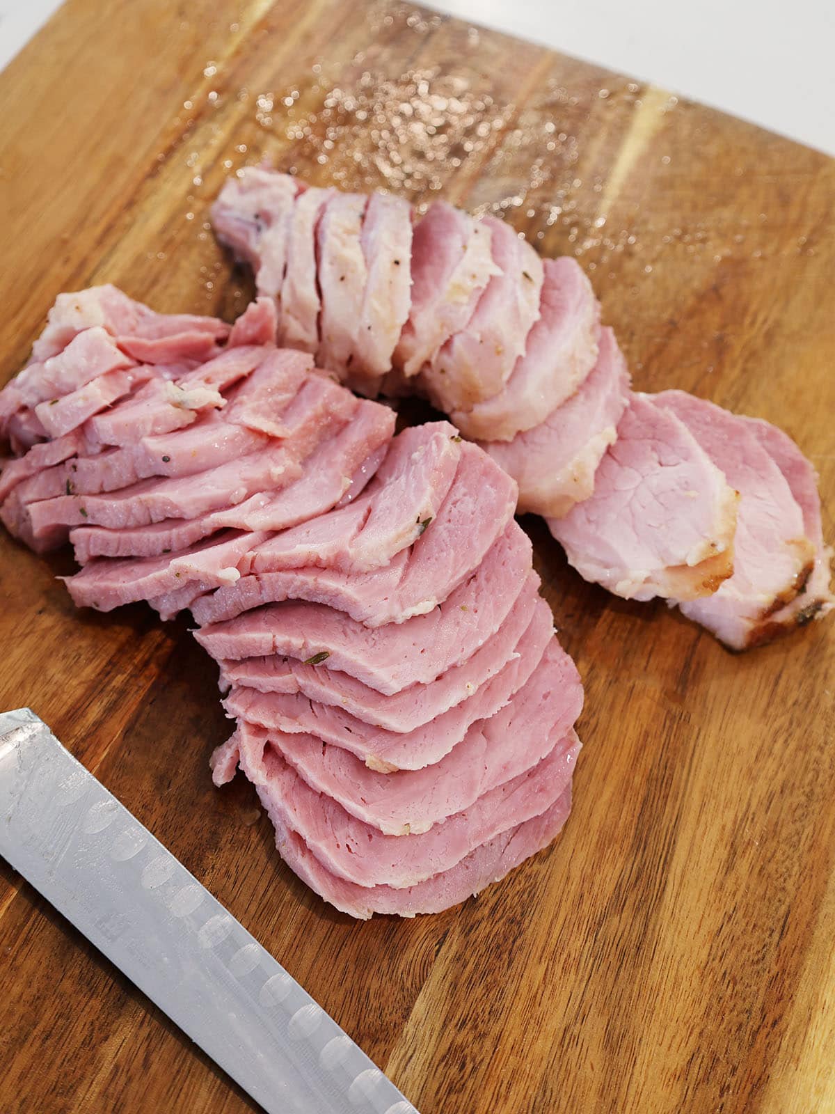 Cut and trimmed slices of ham.