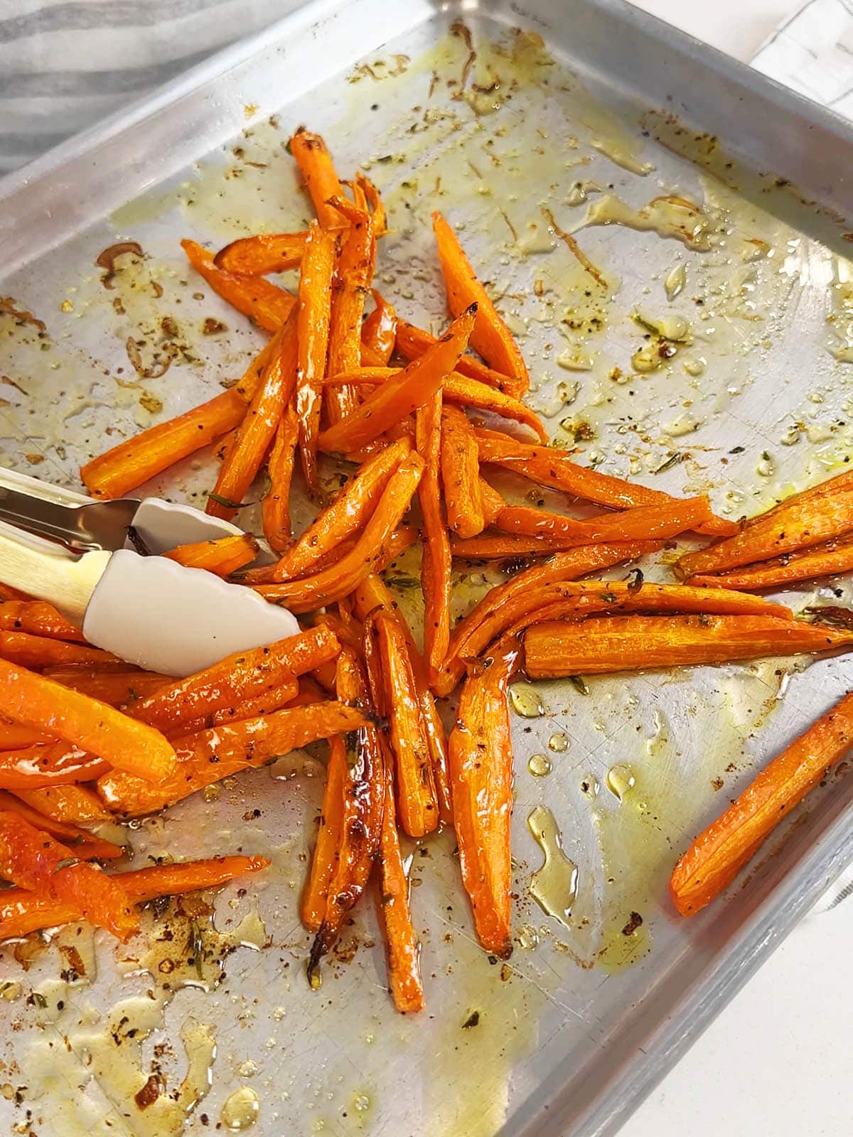 tossing carrots with honey before serving.