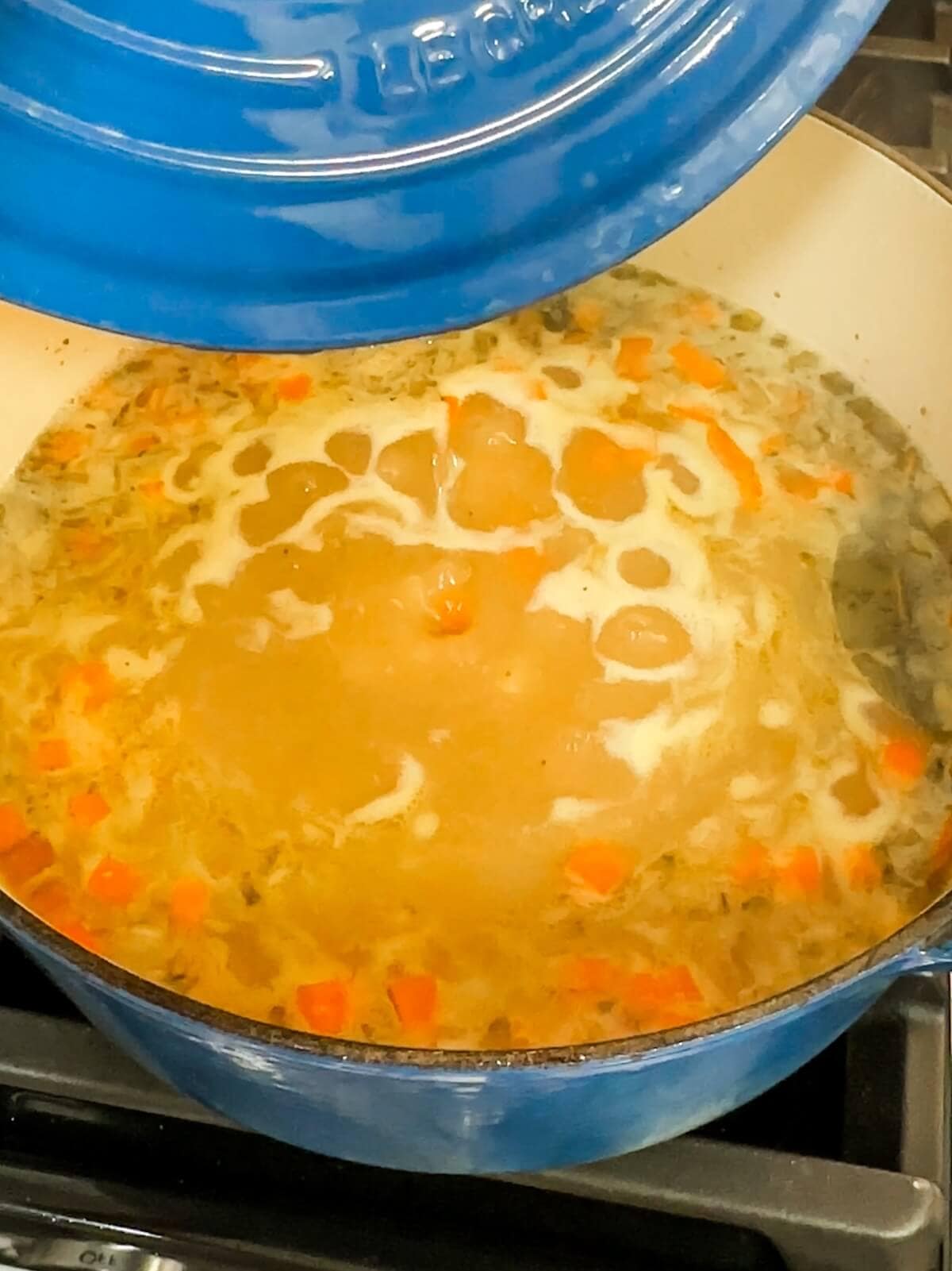 simmering bacon potato soup to soften vegetables. 