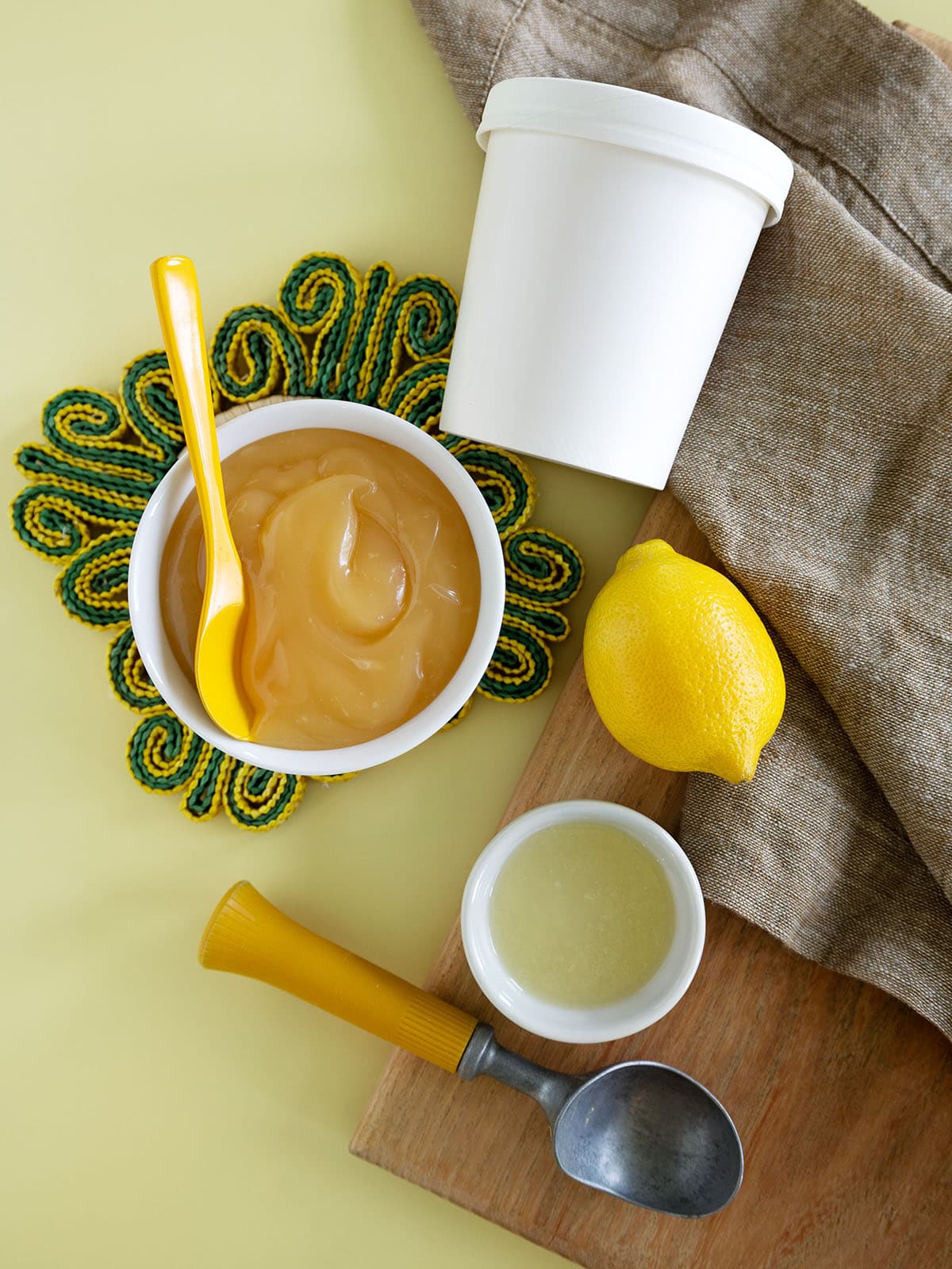 Top view of ingredients needed to make lemon curd ice cream.