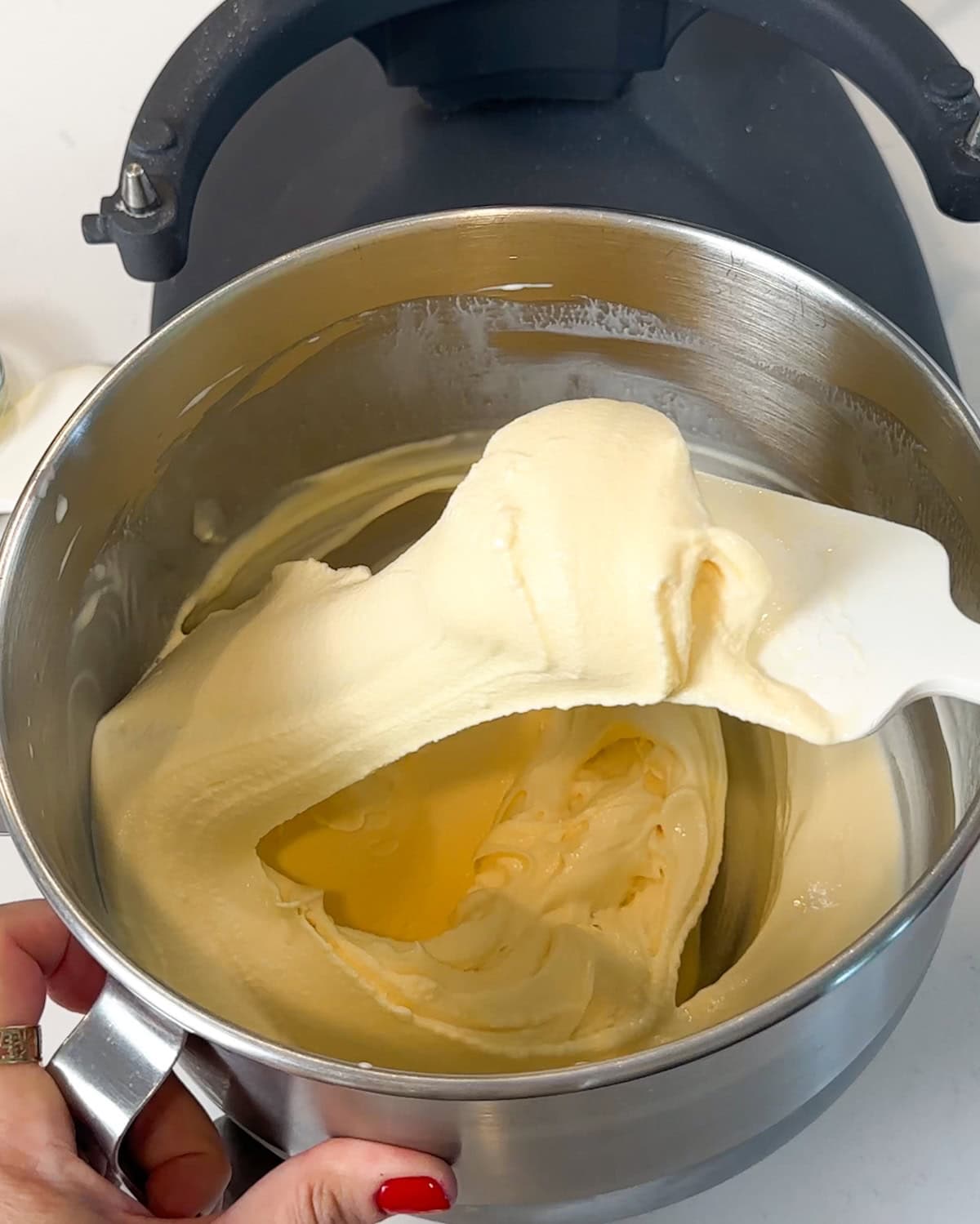 Softened ice cream in a mixing bowl.
