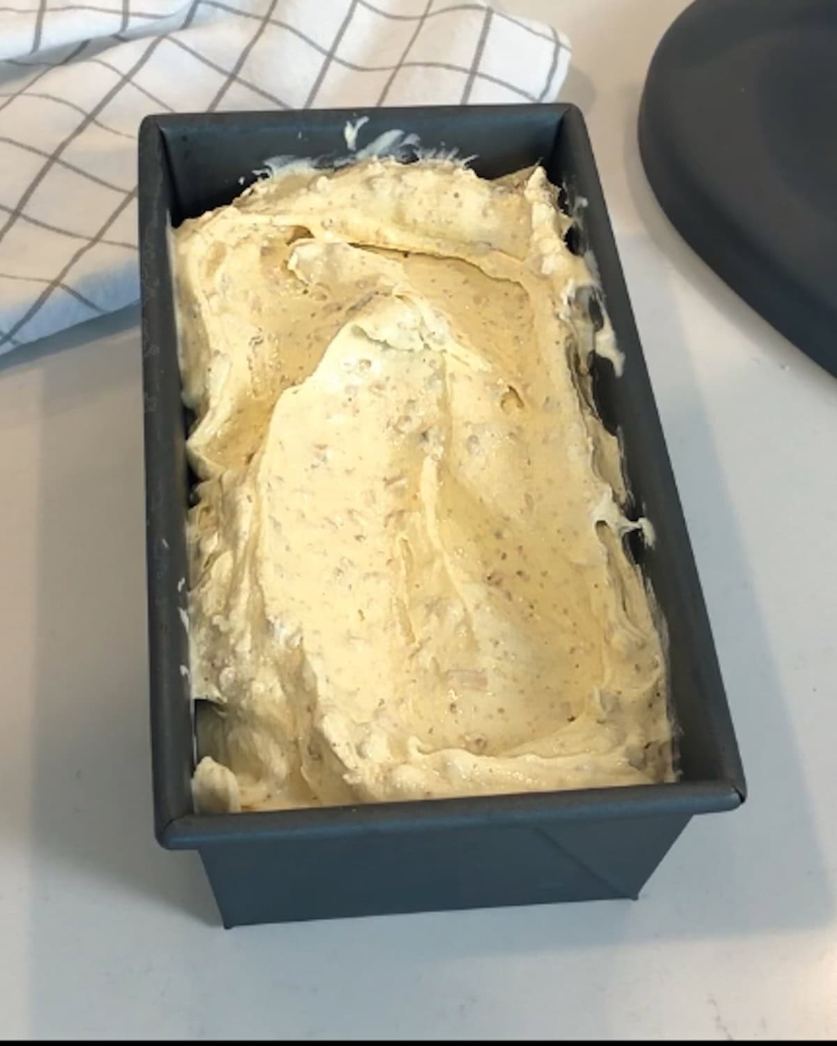Browned butter ice cream in a chilled loaf pan.