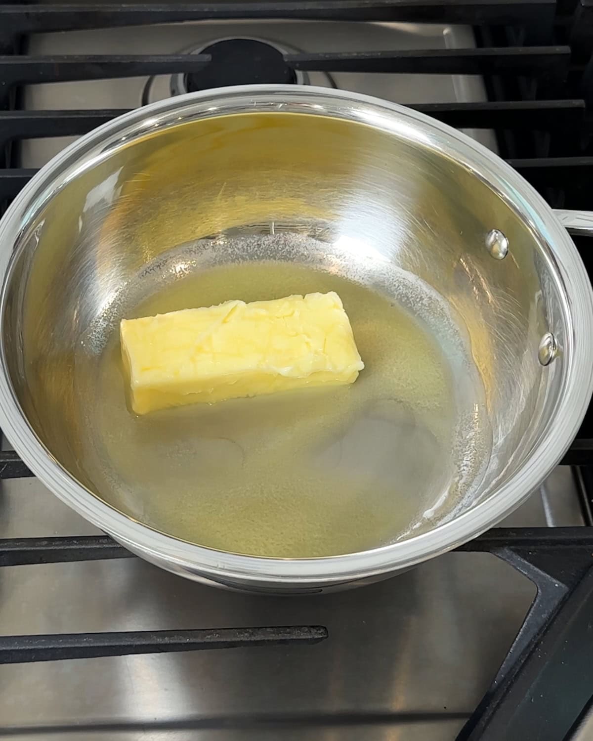 Butter melting in a sauce pan.