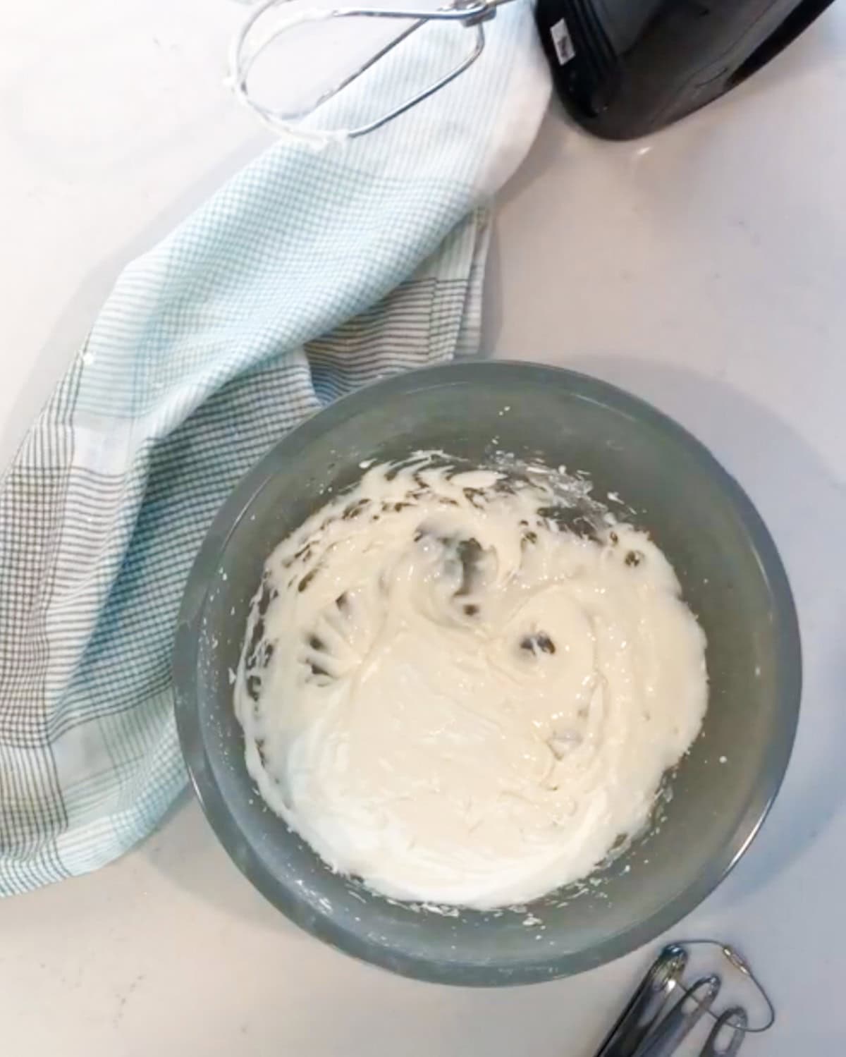 royal icing mixed in a bowl for oatmeal cookies