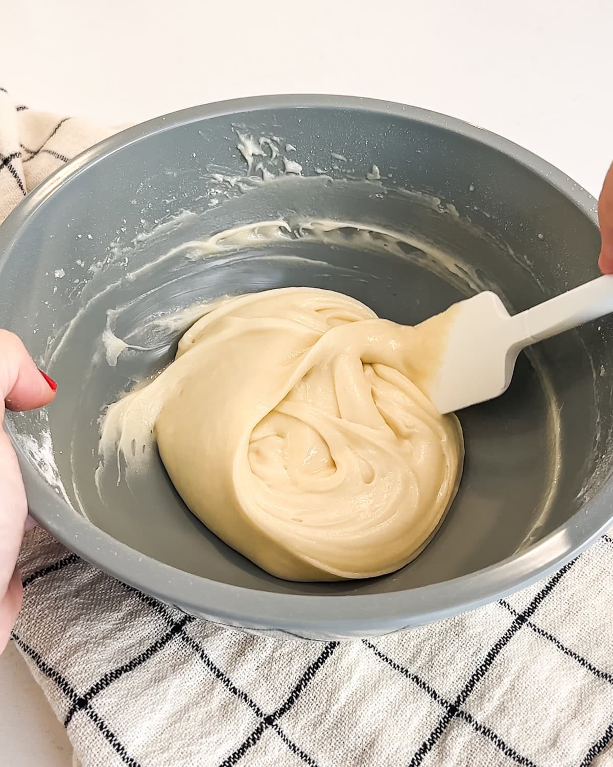 Finished pirouette cookie batter in a blue bowl.